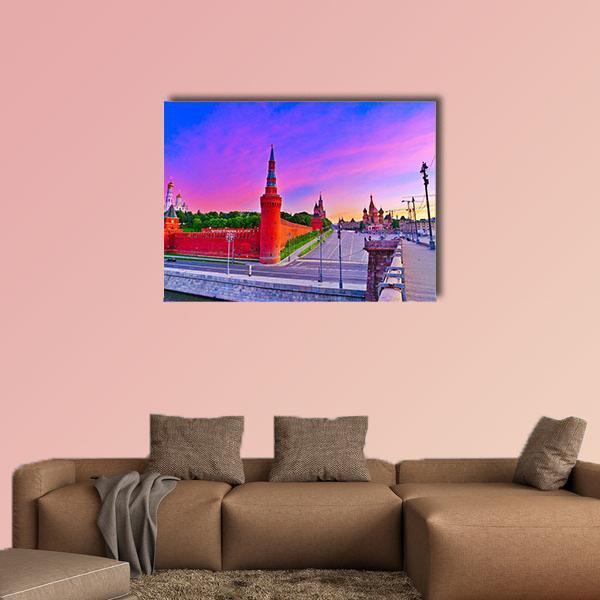 Kremlin River View in Moscow Canvas Wall Art in red, purple and pink, single panel hung on a wall