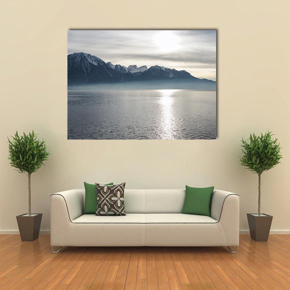 Lake Geneva with Snow-capped Mountains Canvas Wall Art in white, gray and blue, single panel hung on a wall