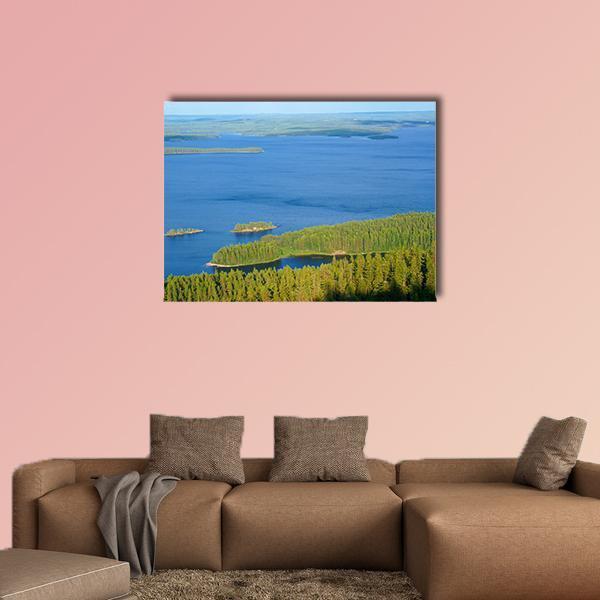 Lake Pielinen with Forested Islands Canvas Wall Art in green and blue, single panel hung on a wall