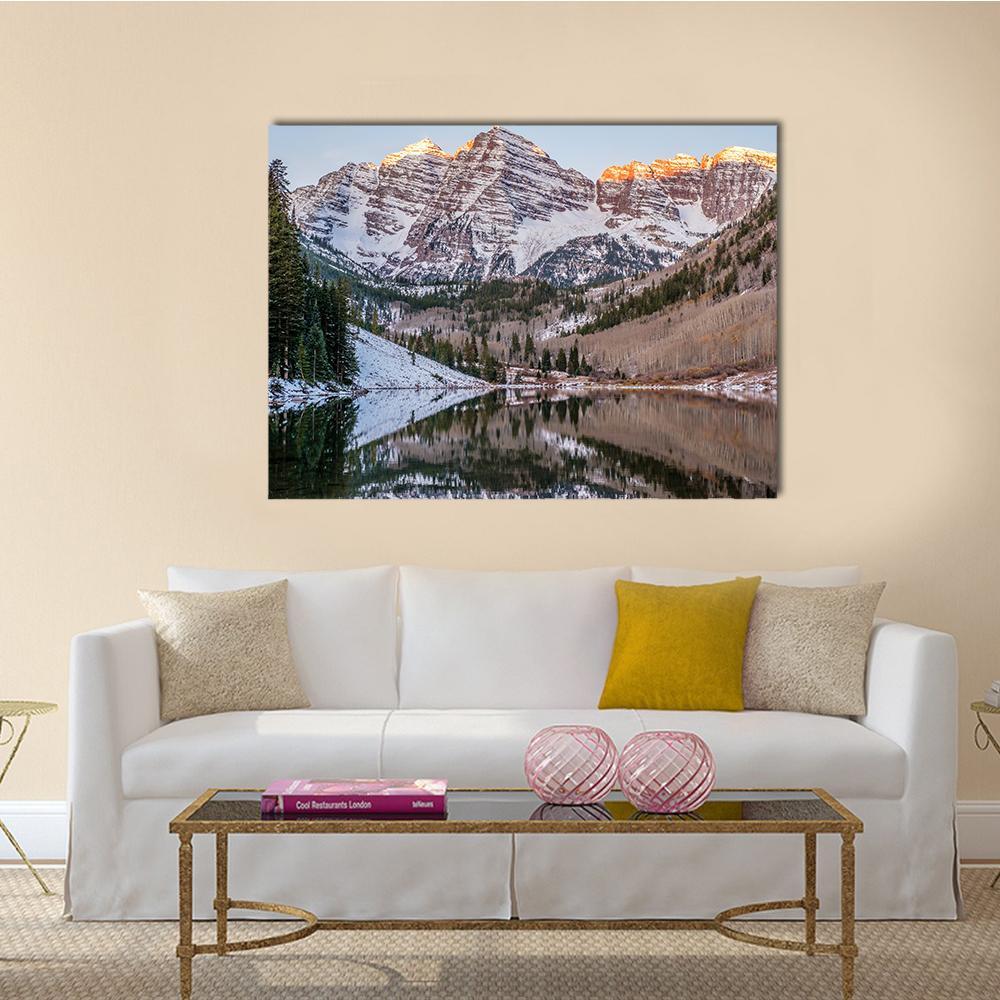 Snow-capped Peaks and Lake Reflection Canvas Wall Art in white, gray and brown, single panel hung on a wall