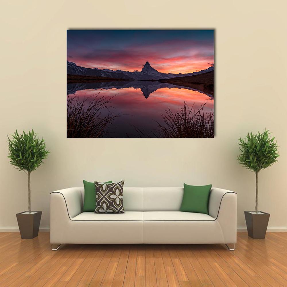 Matterhorn Reflection in Stelli Lake Canvas Wall Art in blue, purple and pink, single panel hung on a wall
