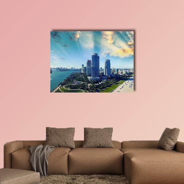 Miami Beach Skyline Over Ocean Park Canvas Wall Art in yellow, green and blue, single panel hung on a wall