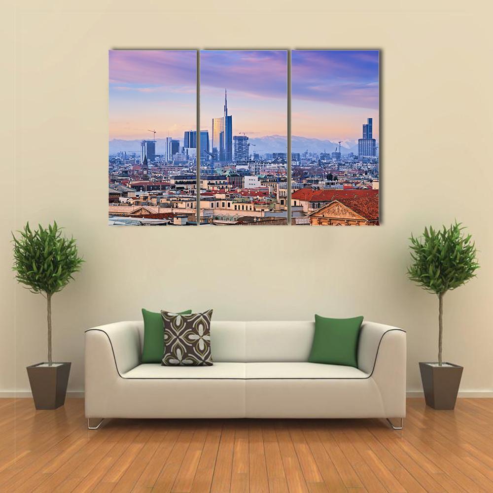 Twilight Urban Skyline with Red-tiled Roofs Canvas Wall Art in red, blue and purple, 3 panel horizontal set hung on a wall