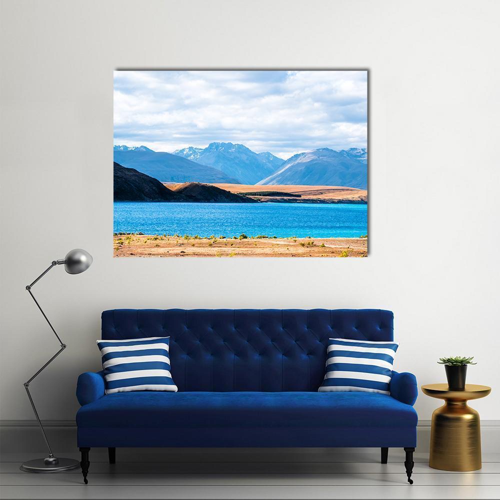 Mount Cook Beside Lake Tekapo Canvas Wall Art in white, brown and blue, single panel hung on a wall