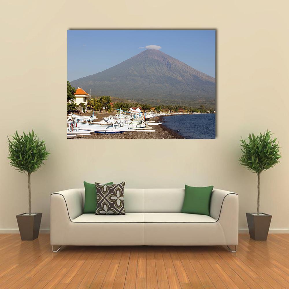 Volcano and Canoes in Indonesia Canvas Wall Art in gray, brown and blue, single panel hung on a wall
