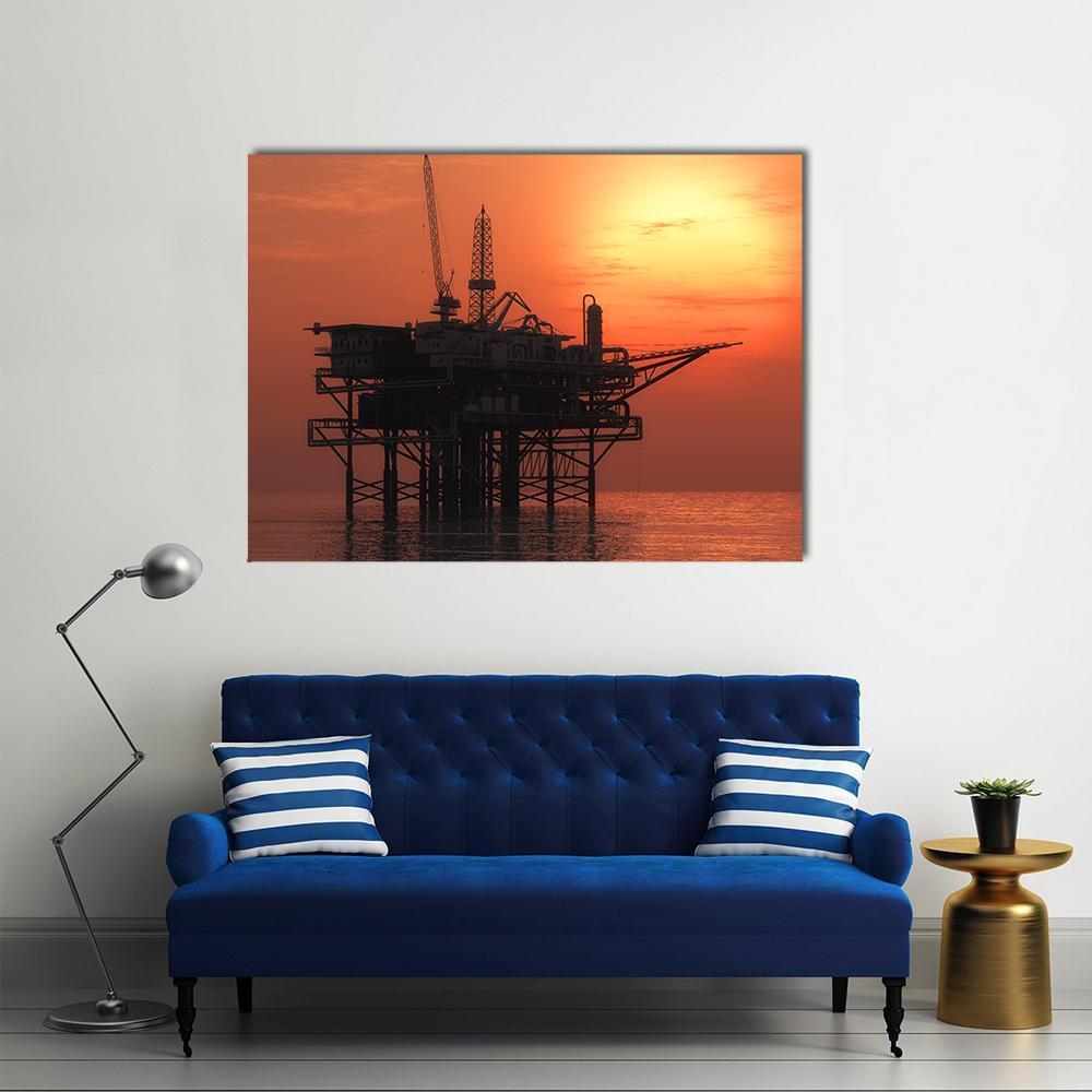 Offshore Oil Rig at Sunset Canvas Wall Art in black, orange and yellow, single panel hung on a wall