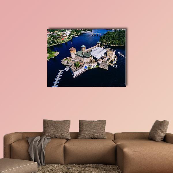 Olavinlinna Medieval Castle Aerial View Canvas Wall Art in gray, green and blue, single panel hung on a wall