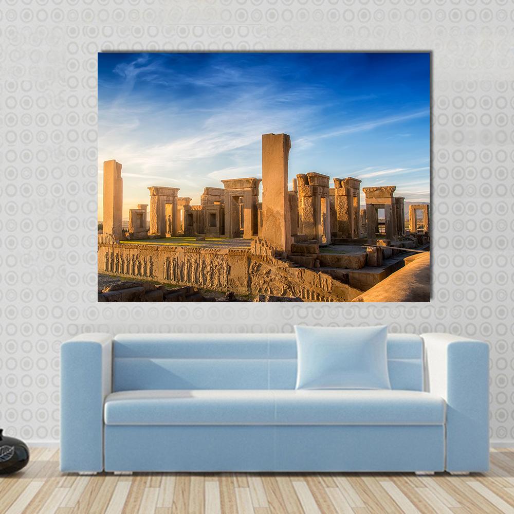 Persepolis Stone Ruins at Golden Hour Canvas Wall Art in brown, gold and blue, single panel hung on a wall