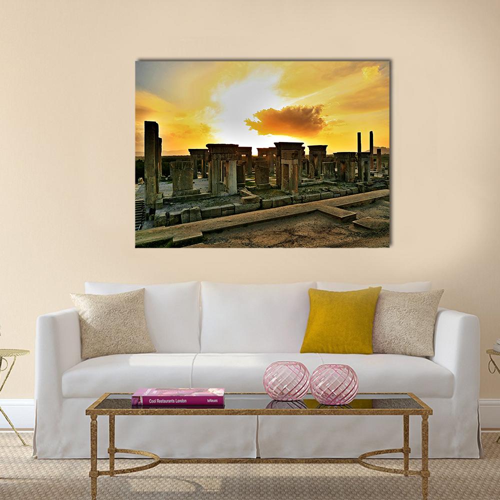 Persepolis at Sunset Canvas Wall Art in brown, orange and yellow, single panel hung on a wall