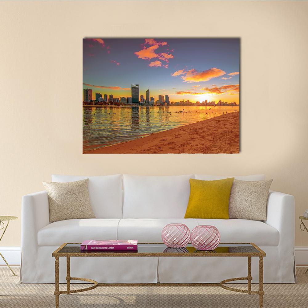 Perth Skyline Over Swan River Canvas Wall Art in orange, yellow and blue, single panel hung on a wall