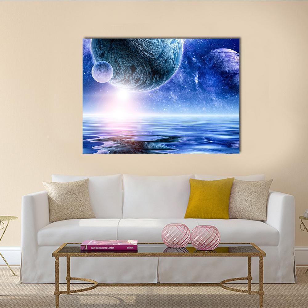 Glowing Planets Over Rippling Cosmic Water Canvas Wall Art in white, blue and purple, single panel hung on a wall