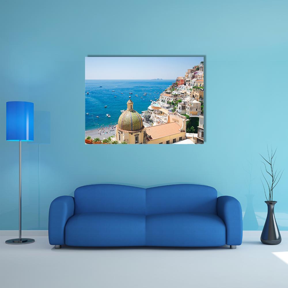 Positano Hillside Overlooking the Sea Canvas Wall Art in beige, orange and blue, single panel hung on a wall