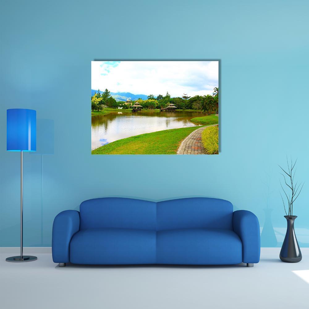 Public Lake Garden View in Malaysia Canvas Wall Art in white, green and blue, single panel hung on a wall