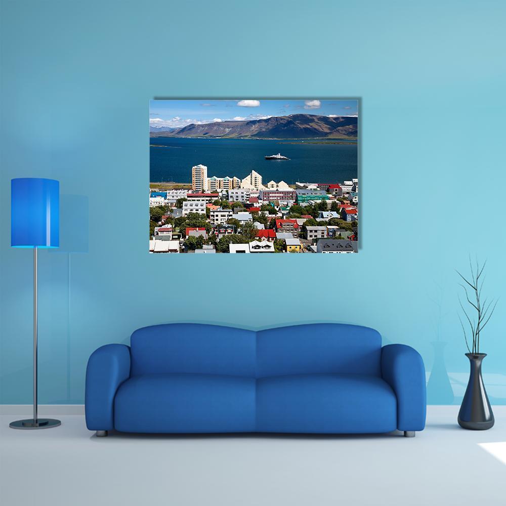 Reykjavik Harbor Aerial View Canvas Wall Art in white, blue and multicolor, single panel hung on a wall