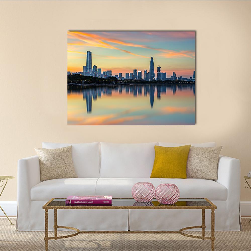 Shenzhen Bay Houhai Skyline at Sunset Canvas Wall Art in orange, yellow and blue, single panel hung on a wall