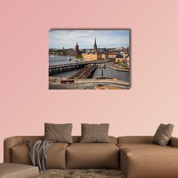 Stockholm Cityscape with Church Spire and Bridges Canvas Wall Art in gray, brown and blue, single panel hung on a wall