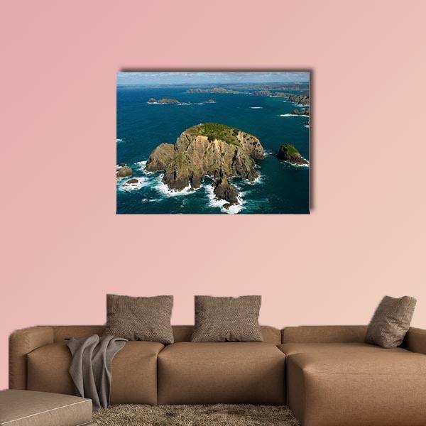 Cavalli Islands Aerial View Canvas Wall Art in brown, green and blue, single panel hung on a wall