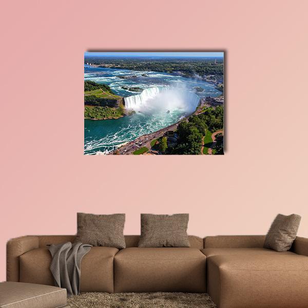 Aerial View of Horseshoe Falls Canvas Wall Art in white, green and blue, single panel hung on a wall