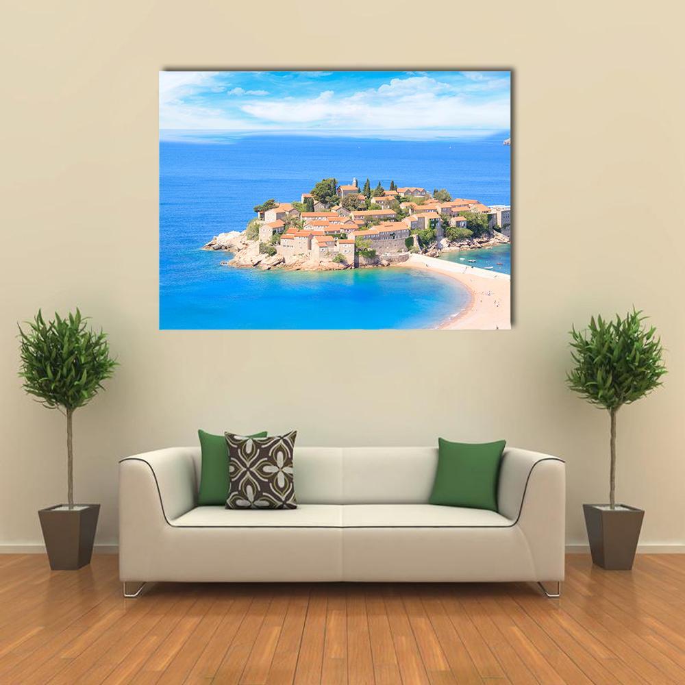 Island Village on Sandy Beach Canvas Wall Art in beige and blue, single panel hung on a wall