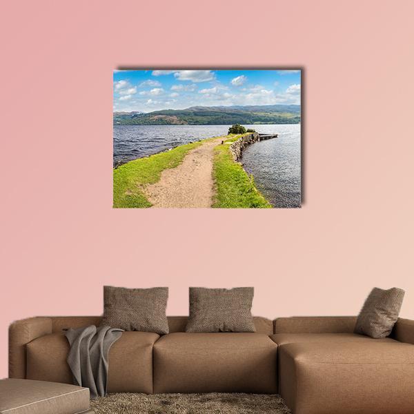 Loch Ness Landscape with Path and Stone Canvas Wall Art in gray, green and blue, single panel hung on a wall