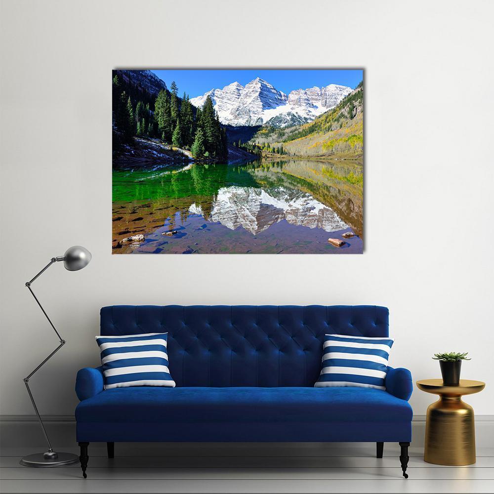 Maroon Bells Foliage Reflection Canvas Wall Art in white, green and blue, single panel hung on a wall