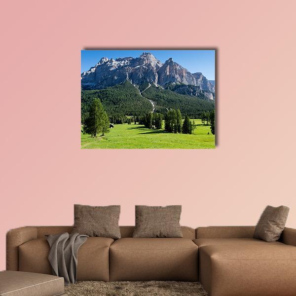 View of Mount Alta Badia Canvas Wall Art in gray, green and blue, single panel hung on a wall