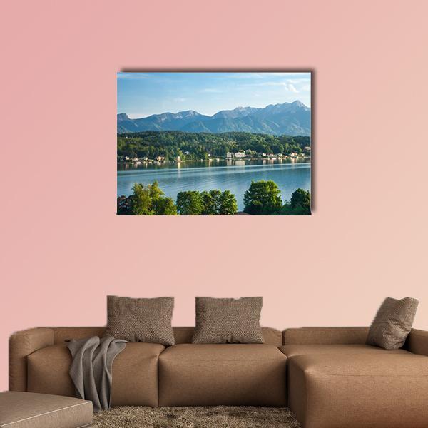 Mountain Lake with Snow-capped Peaks Canvas Wall Art in green and blue, single panel hung on a wall