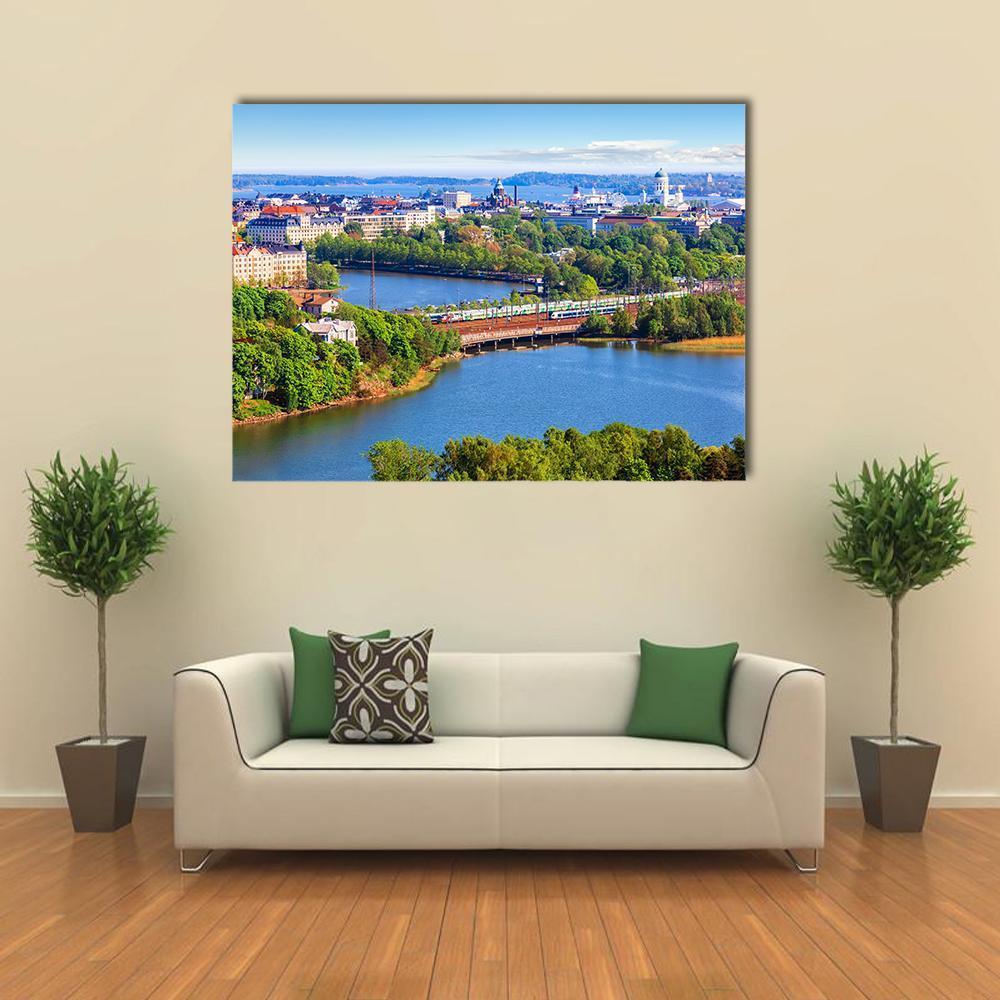 Helsinki Old Town Skyline Canvas Wall Art in green and blue, single panel hung on a wall