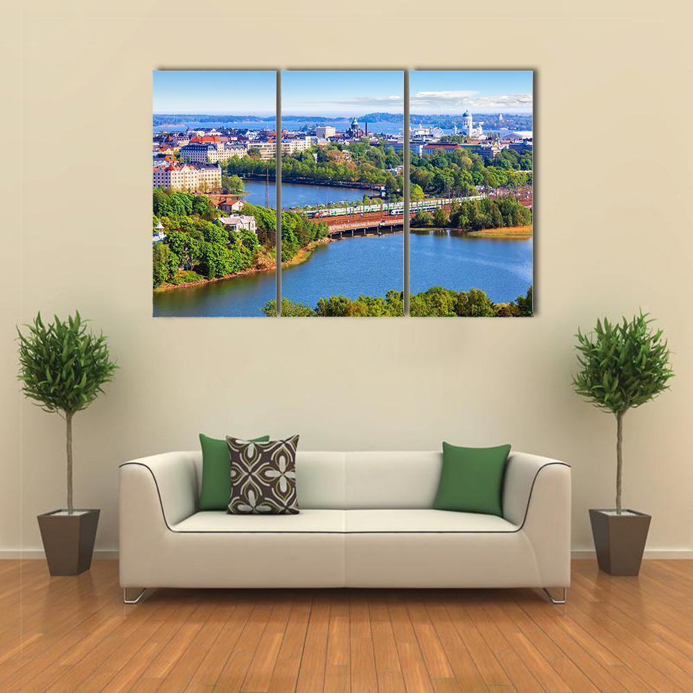 Helsinki Old Town Cityscape Canvas Wall Art in green and blue, 3 panel horizontal set hung on a wall