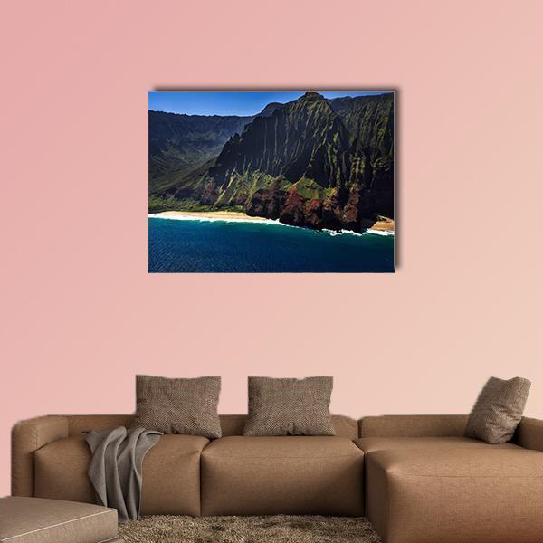 Remote Tropical Coastline Aerial View Canvas Wall Art in brown, green and blue, single panel hung on a wall