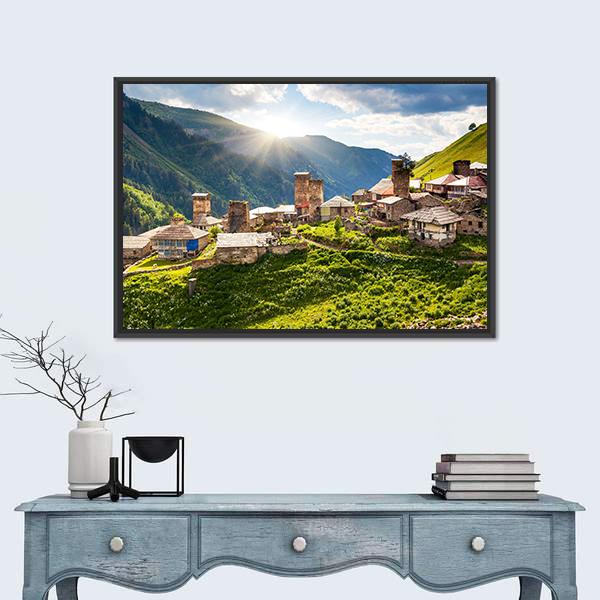 Adishi Village in Georgia Canvas Wall Art in white, green and blue, framed canvas, product view on a white background
