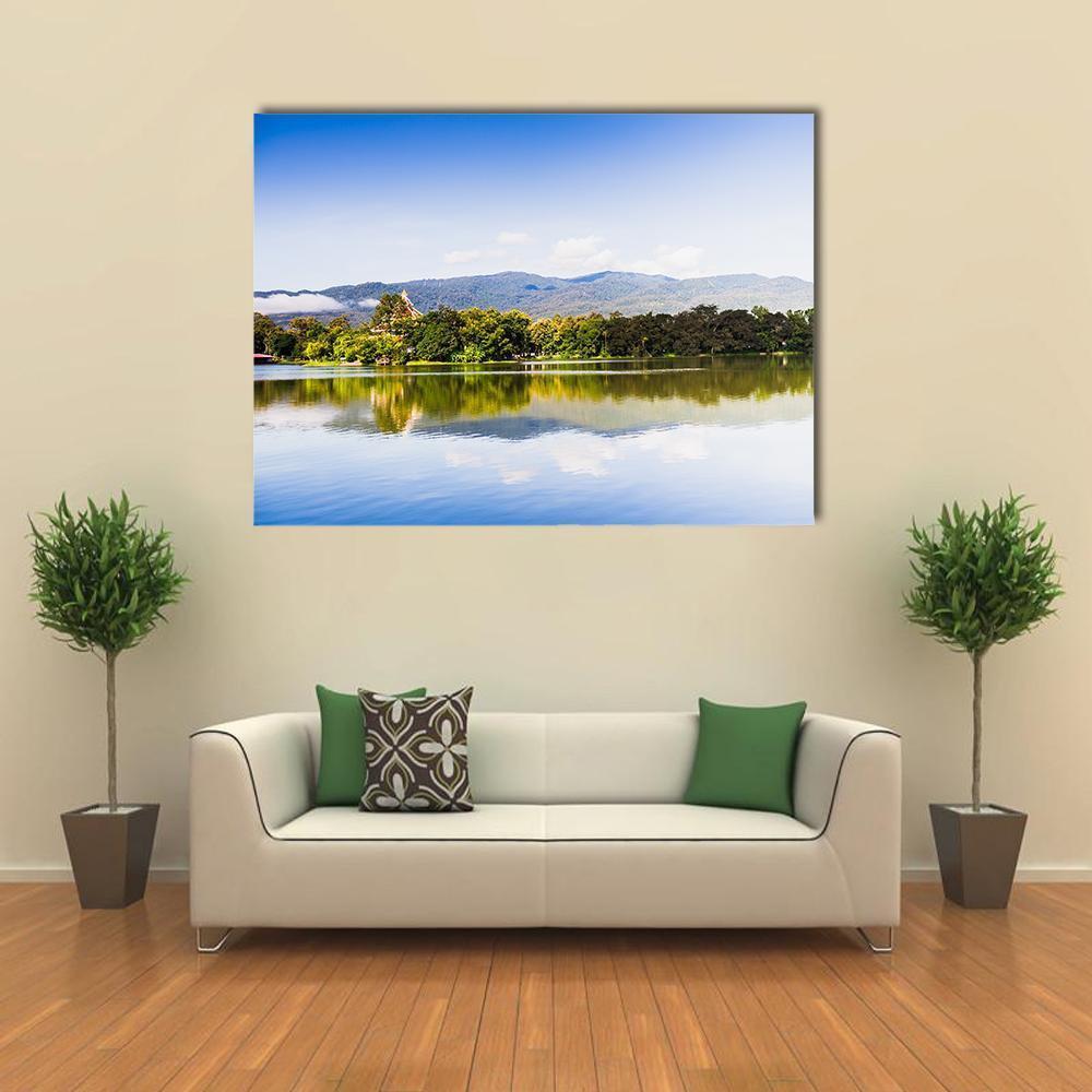 Lake Reflection with Golden Roof Temple Canvas Wall Art in white, green and blue, single panel hung on a wall