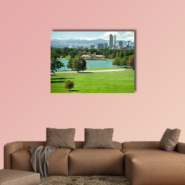 Park Lake with Distant City Skyline Canvas Wall Art in white, green and blue, single panel hung on a wall