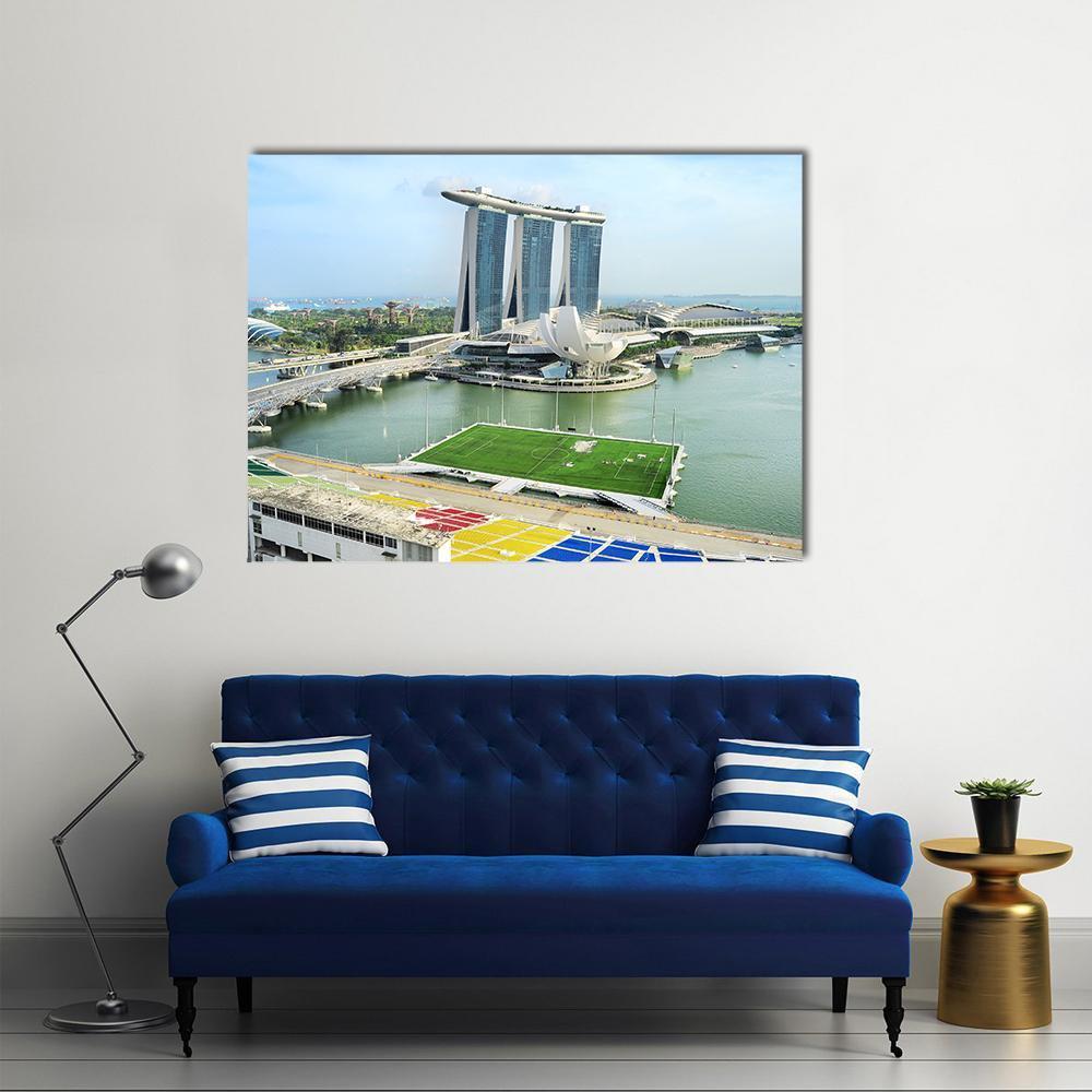 Marina Bay Sands Waterfront View Canvas Wall Art in white, green and blue, single panel hung on a wall