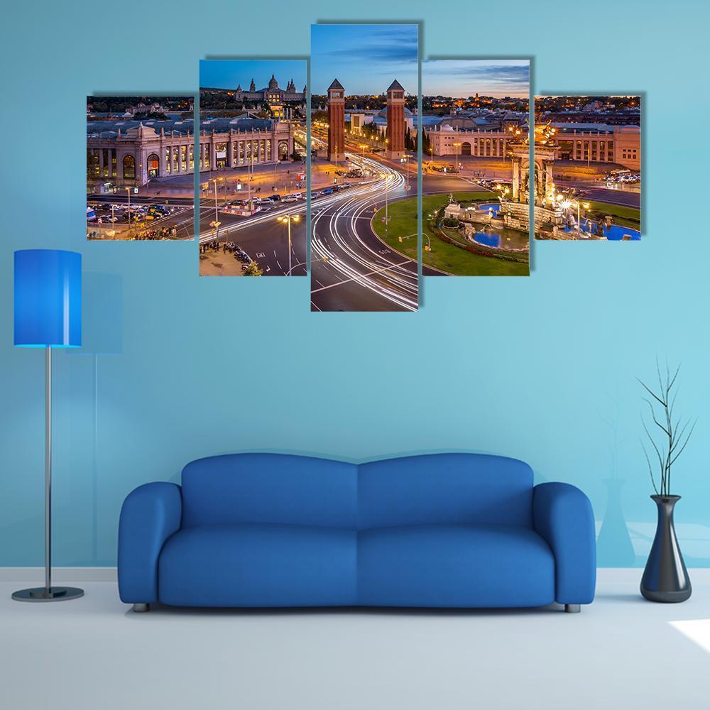 Placa Espanya Evening City View Canvas Wall Art in orange, yellow and blue, 5 panel Star layout hung on a wall
