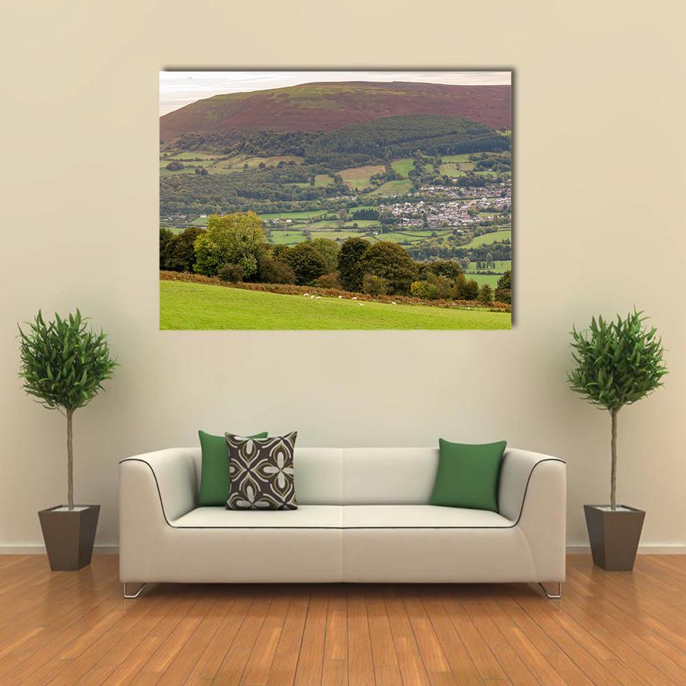 View Over Gilwern Hill Canvas Wall Art in brown and green, single panel hung on a wall