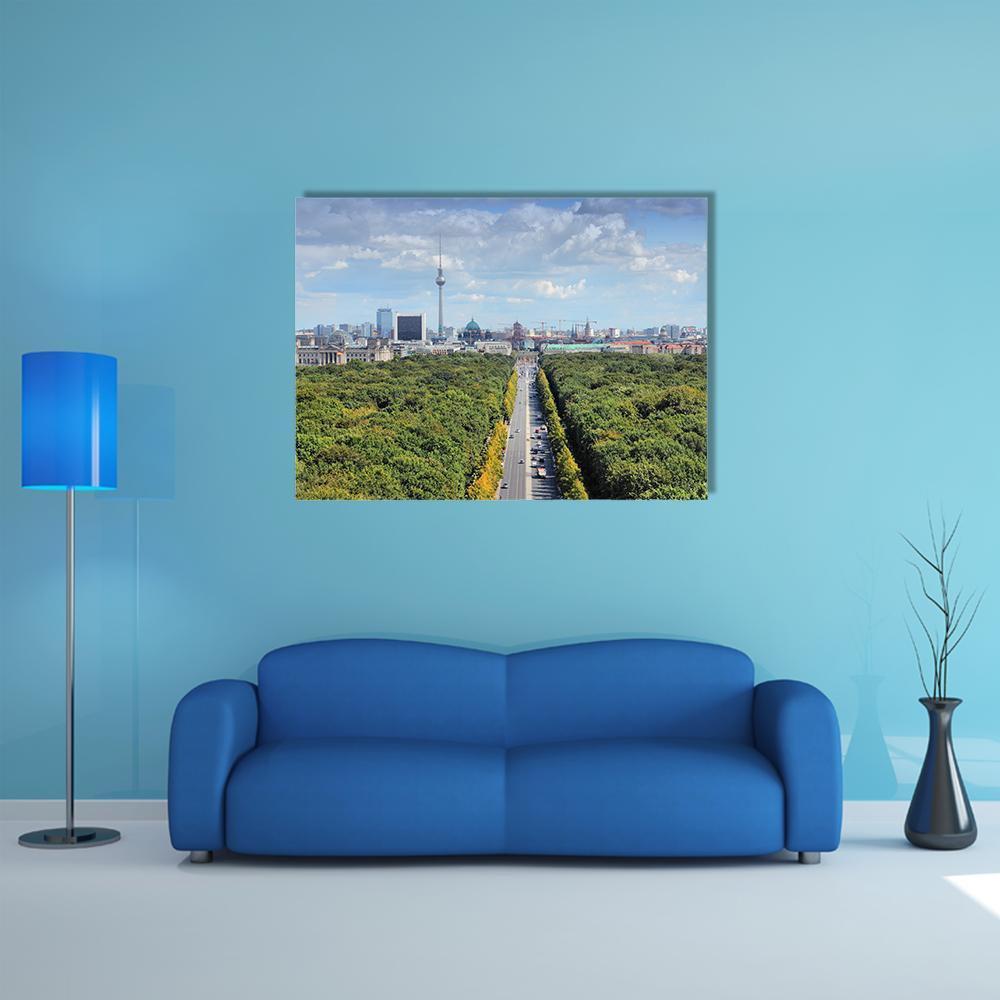 Tree-lined Avenue with Tv Tower Canvas Wall Art in gray, green and blue, single panel hung on a wall