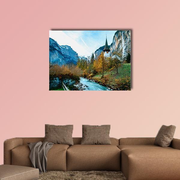 Lauterbrunnen Village in Swiss Alps Canvas Wall Art in brown, green and blue, single panel hung on a wall