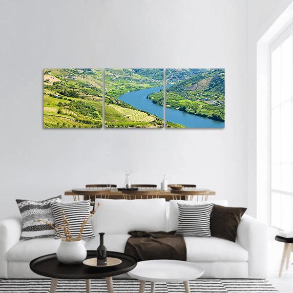 Douro Valley Vineyards Panoramic Canvas Wall Art in green and blue, hung on a wall