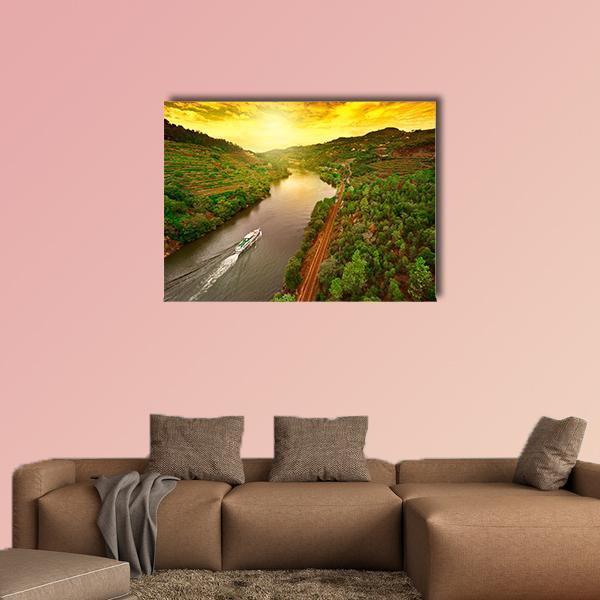 Douro Valley Vineyards at Sunset Canvas Wall Art in orange, yellow and green, single panel hung on a wall