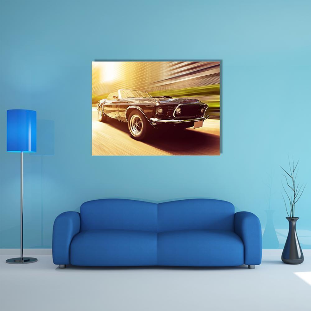 Golden Hour Muscle Convertible in Motion Canvas Wall Art in black, brown and yellow, single panel hung on a wall