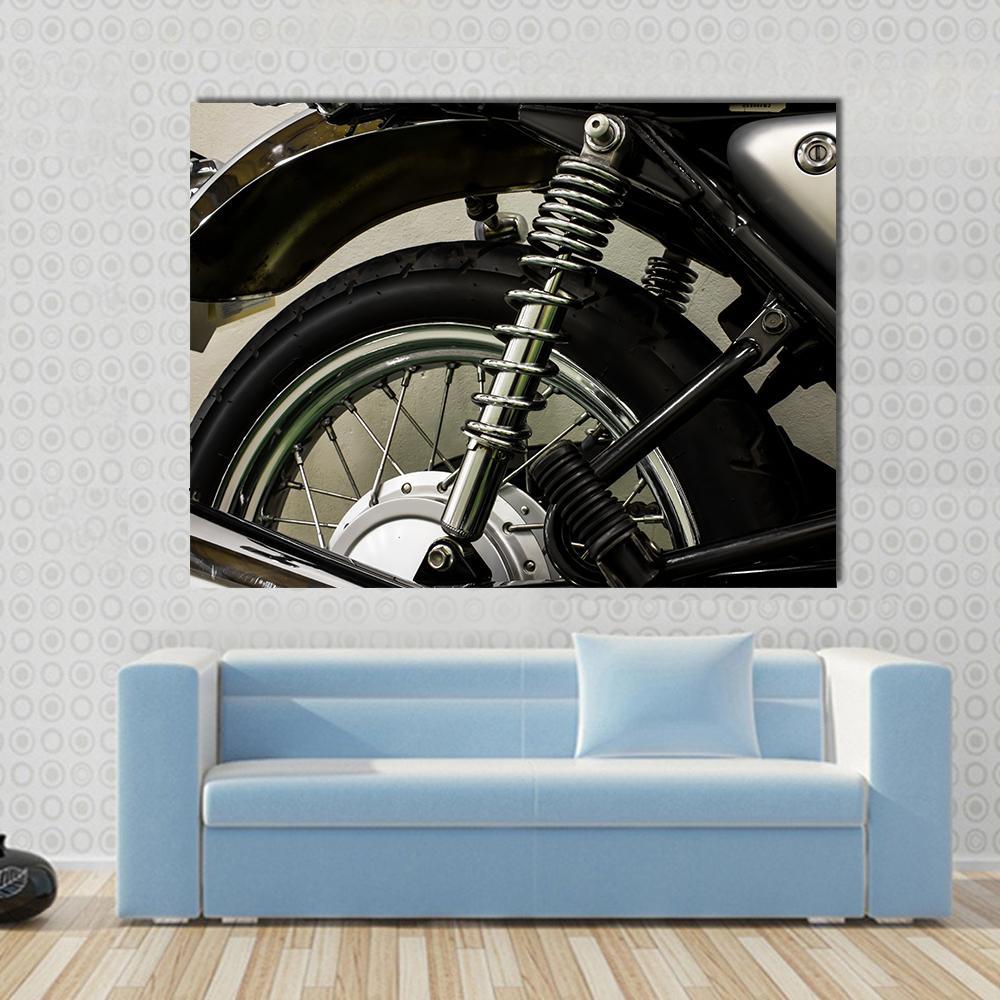 Vintage Motorcycle Detail Canvas Wall Art in black, gray and silver, single panel hung on a wall