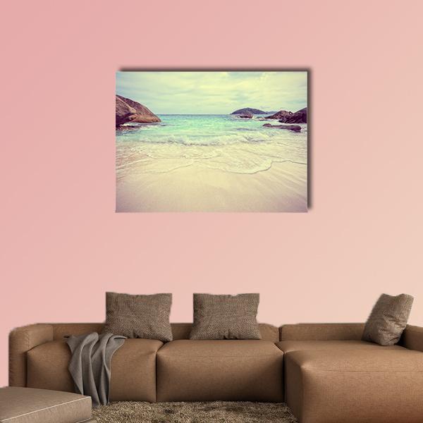 Vintage Blue Sea Canvas Wall Art in beige and blue, single panel hung on a wall