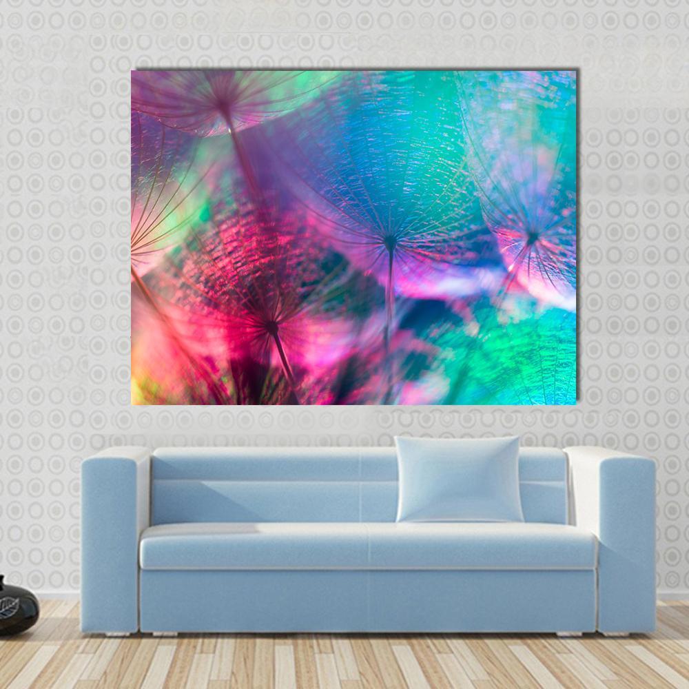 Vivid Color Abstract Dandelion Flower Canvas Wall Art in blue, pink and multicolor, single panel hung on a wall