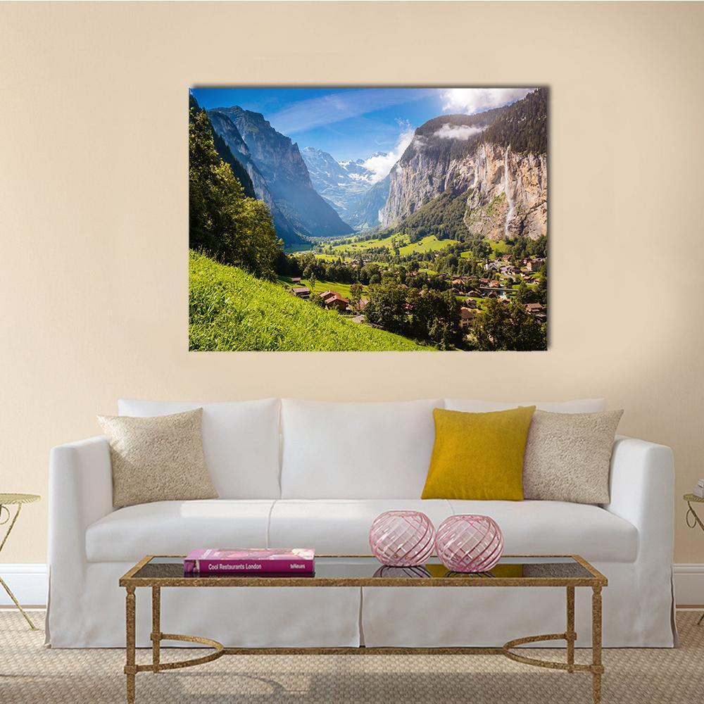 Vivid Alpine Village View Canvas Wall Art in gray, green and blue, single panel hung on a wall