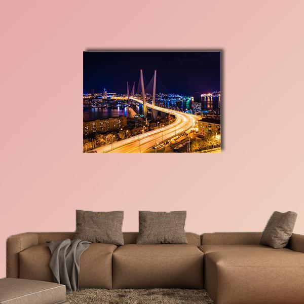 Vladivostok Hali Bridge at Night Canvas Wall Art in black, yellow and blue, single panel hung on a wall
