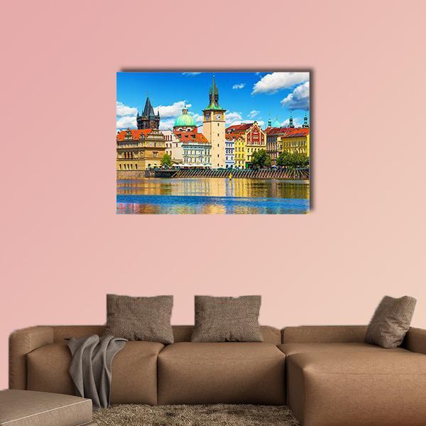 Vltava River Pier in Prague Canvas Wall Art in orange, yellow and blue, single panel hung on a wall