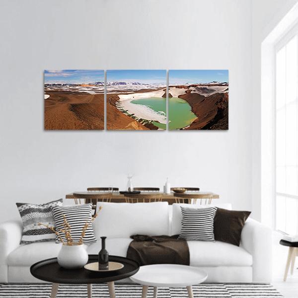 Turquoise Crater Lake in Volcanic Landscape Panoramic Canvas Wall Art in white, brown and blue, hung on a wall