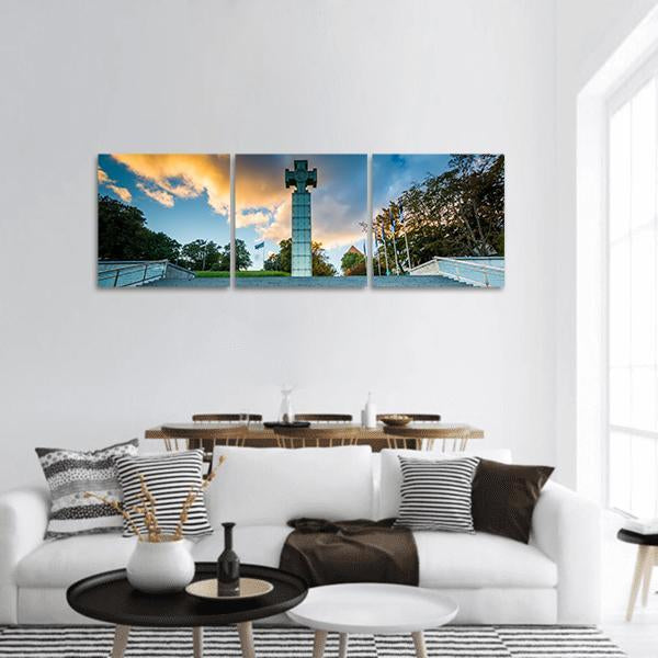 Freedom Square in Tallinn Panoramic Canvas Wall Art in gray, orange and blue, hung on a wall