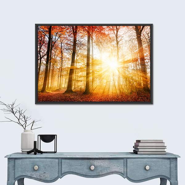 Warm Autumn Scenery in a Forest with Sun Rays Canvas Wall Art in brown, orange and yellow, framed canvas, product view on a white background